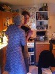 Hour 23. Katie and mum dancing in the kitchen
